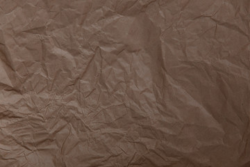 Brown crumpled wrapping paper as background