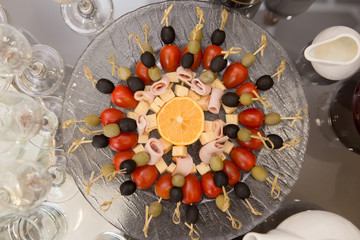 fruit catering served on a plate.