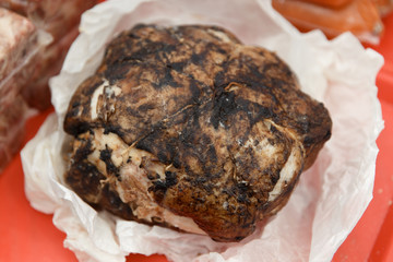 Meat dishes are prepared on open fire at the Fair