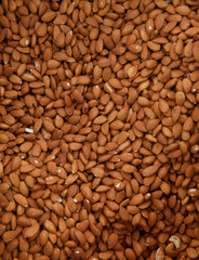 Healthy food. Peeled almonds as food background.
