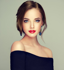 Beautiful model girl  with elegant hairstyle . Woman with fashion style makeup