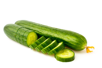 Sliced fresh cucumber on a white