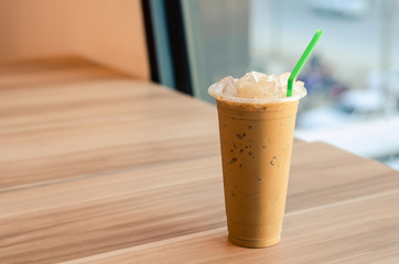 ice coffee on wood table.