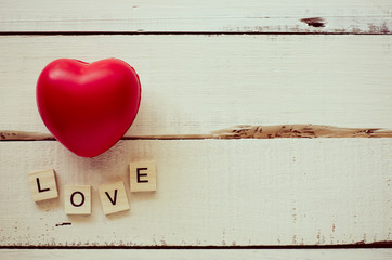 Valentines Day background with hearts and the word love.