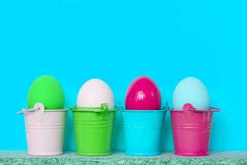 Bright colored dyed eggs on white. Happy Easter eggs card 