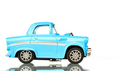 Fototapeta na wymiar Light Blue Toy car on white background