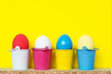 Bright colored dyed eggs on white. Happy Easter eggs card 