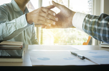  Two businessmen shaking hands during a meeting in the office, success, dealing, greeting & business partner.