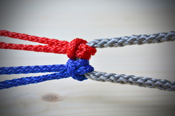 Connection concept as ropes tied and linked together