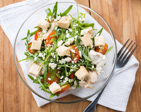 Arugula Salad With Boiled Chicken And Goat Cheese In Bowlfor Healthy Meal