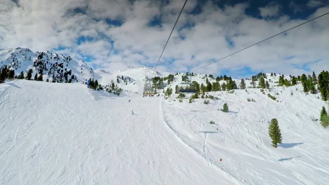 People skiing in famous ski resort Zillertal in Tyrolian Alps, Austria 
