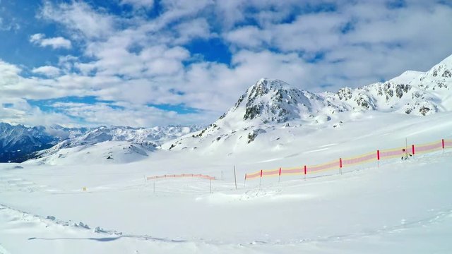 People skiing in famous ski resort in Tyrolian Alps, Zillertal, Austria 
