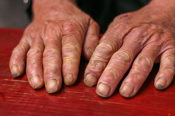 Fototapeta premium Hands of a hard worker man