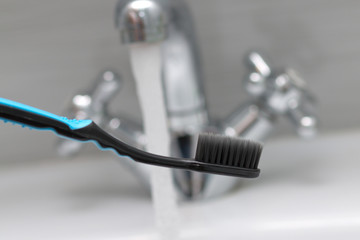 Toothbrush, oral hygiene. Bathroom. Selective focus.