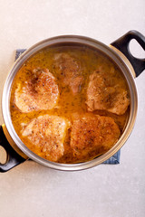 Spicy chicken casserole in a pan