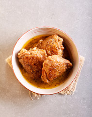 Spicy chicken thighs casserole in a bowl