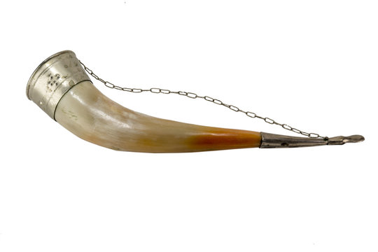 Old cup of the bull's horn decorated with silver rim