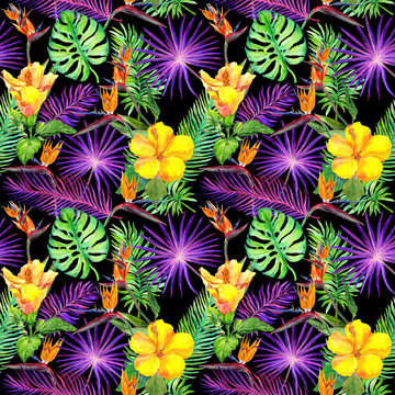Tropical leaves, exotic flowers. Seamless pattern on black background. Watercolor