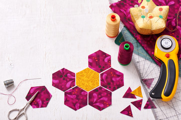 Preparation of hexagon pieces of fabric for sewing a quilt Grandmother's Flower Garden