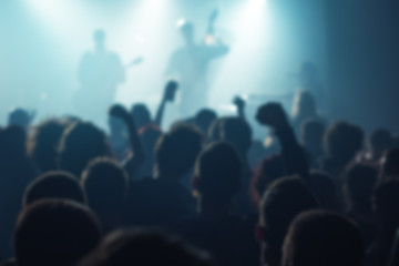 Fototapeta na wymiar Blur defocused music concert crowd as abstract background