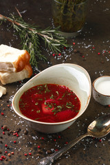 Traditional Ukrainian red borsch with pampushkas and sour cream