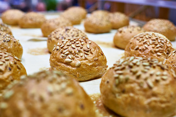 Fresh bread buns with sunflower seeds