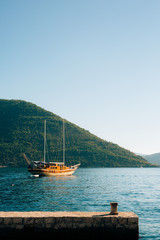 Fototapeta na wymiar Wooden sailing ship. Montenegro, Bay of Kotor. Water transport
