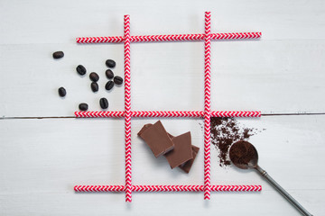 chocolate, coffee beans and spoon with coffee