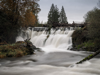 Fototapeta na wymiar Waterfall In River