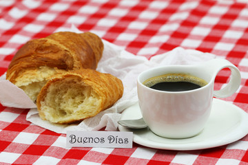 Buenos Dias (Good morning in Spanish) card with cup of coffee and croissant on checkered cloth
