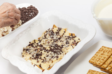 Napoleon dessert preparation : Adding chocolate chips and nuts