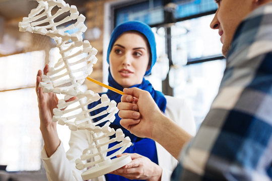 Smart international students learning genetics