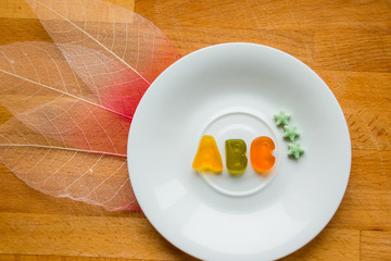food sweet letters. Sweet alphabet. ABC text,   Message lined with edible letters, Letters ABC for children alphabet learning . healthy eating