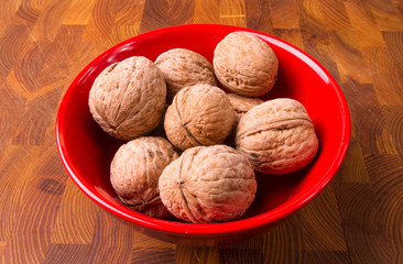 walnuts in red plate
