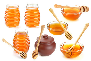 Isolated honey. Glass bowl, pot and honey stick isolated on white background with clipping path