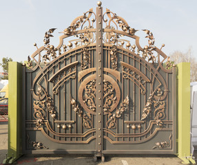 Forged flower decorative element gates Hammered gates.