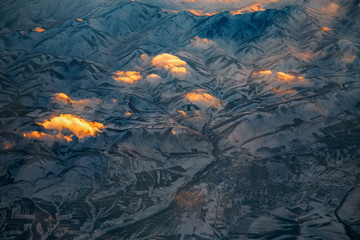 Sunset clouds, view from above air plane window