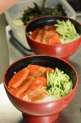 Salmondon,sashimi and rice mix venigar,cucumber and nori