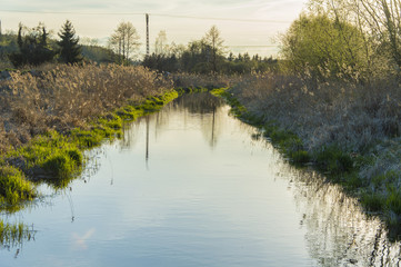 Zachód słońca nad rzeką, Lipsko, Polska © olekgraf