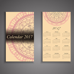 Vector calendar 2017 with decorative elements. Vector mandala design. Template can be used for web and print design.
