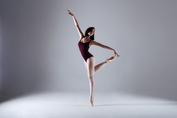 Ballerina dancing in the darkness