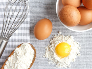Chicken rind eggs, flour, ingredients and props shape and corolla for cooking homemade baking flat lay