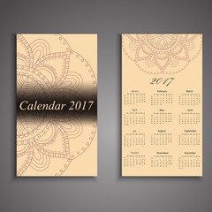 Vector calendar 2017 with decorative elements. Vector mandala design. Template can be used for web and print design.