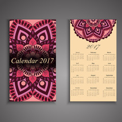 Vector calendar 2017 with decorative elements. Vector mandala design. Template can be used for web and print design.