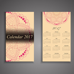 Vector calendar 2017 with decorative elements. Vector mandala design. Template can be used for web and print design.