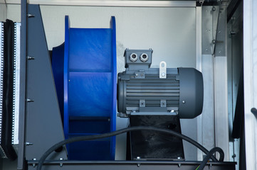 Close-up photo of the electric fan motor placed in the air handling unit