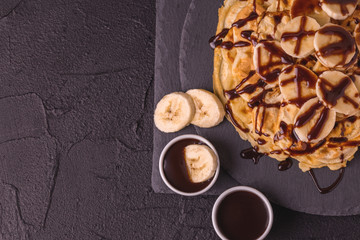 Belgium waffles with banana and hot chocolate