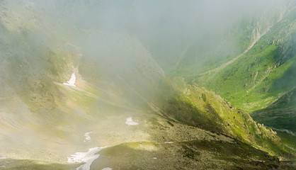 Beautiful landscape of Romanian mountains. Negoiu. Porumbacu de Sus. Cabana Negoiu. Sibiu. Above clouds. Forest. Amazing holiday in mountains.