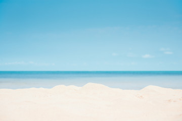 Beautiful sand beach and blue sky background
