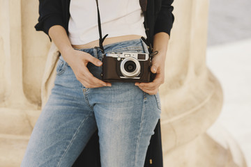 Girl with a vintage camera